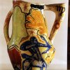 Grande vaso ornamentale - Grande vaso policromo, decorato a smalti, realizzato con la tecnica del colombino. Angelo Peluso (?).Scarica il file